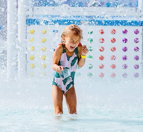 a girl in a swimsuit in a pool