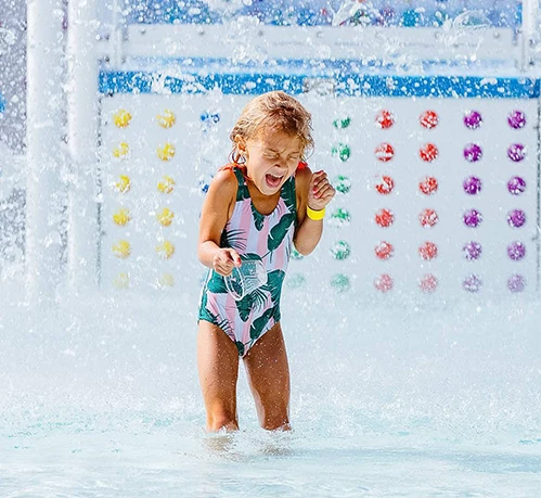 a girl in a swimsuit in a pool