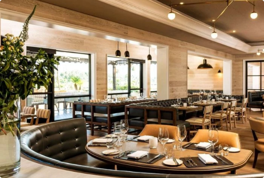 a restaurant with tables and chairs