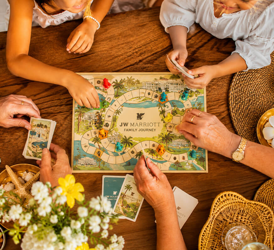 a group of people playing a board game