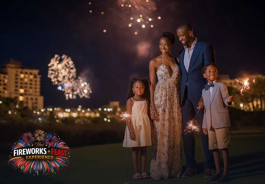 a group of people standing in front of fireworks