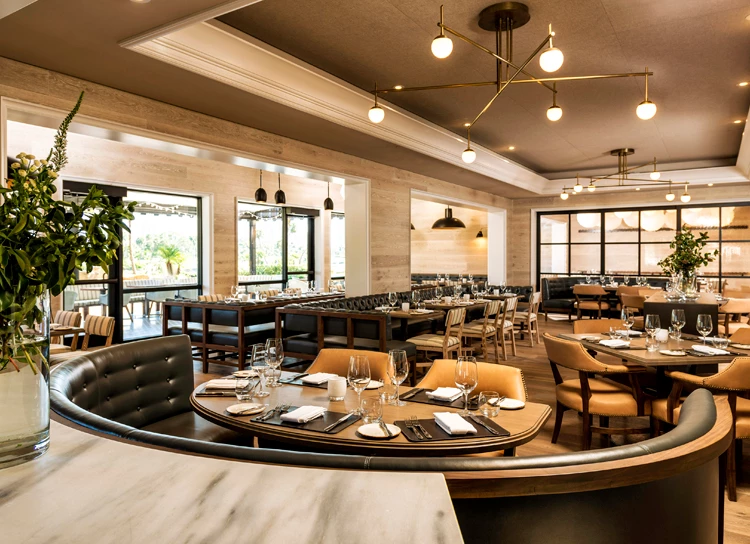 a restaurant with tables and chairs