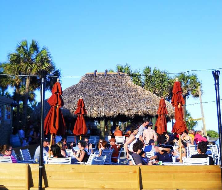 a group of people sitting at a table