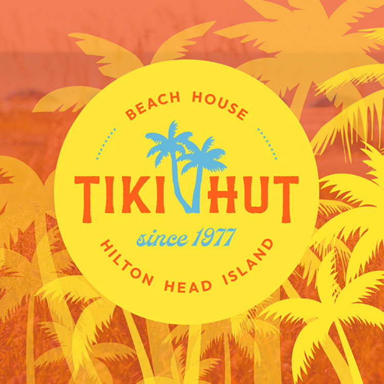 a yellow circle with blue text and palm trees