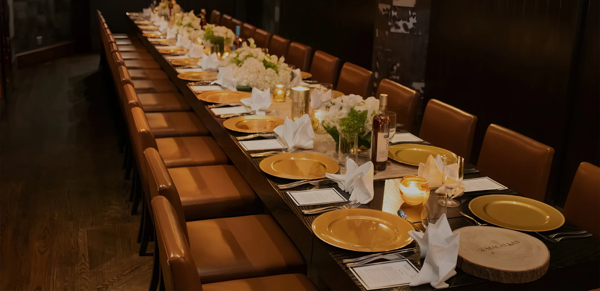 a long table with plates and napkins