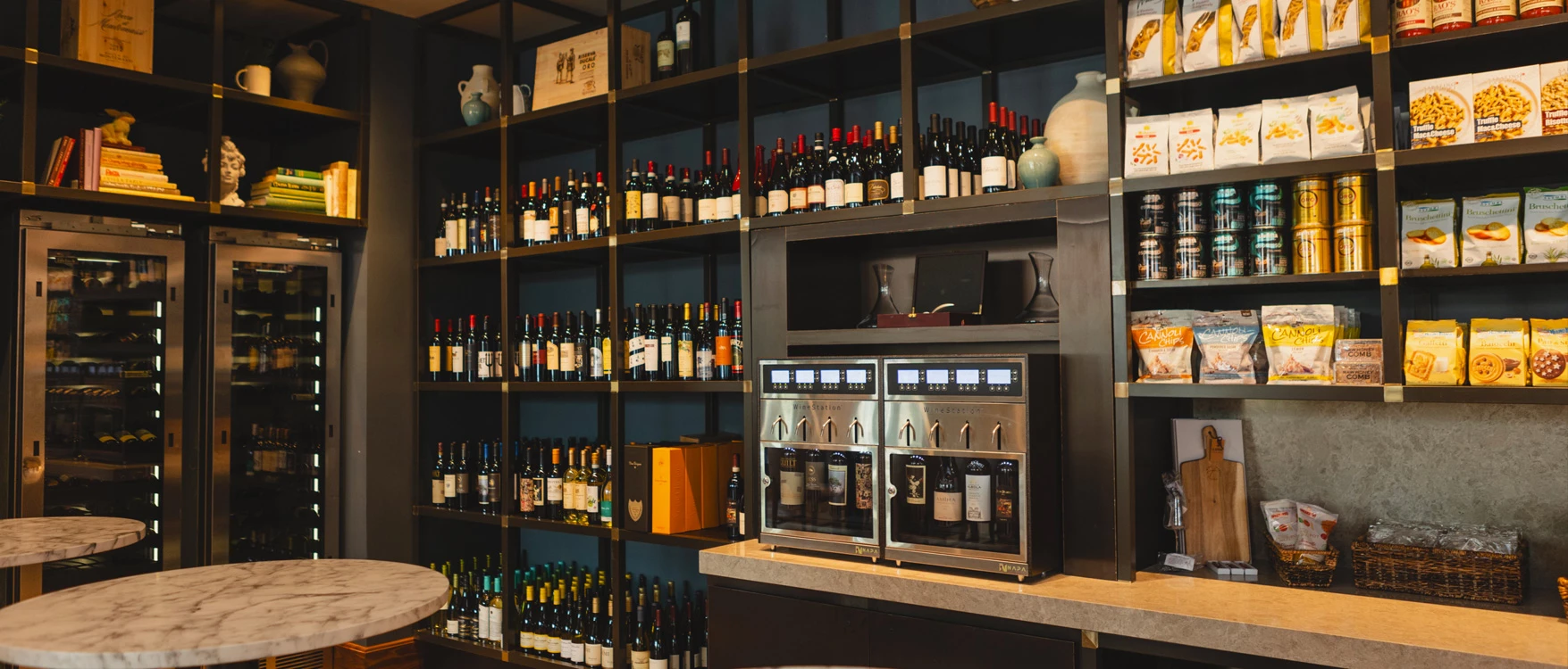 a bar with shelves of alcohol