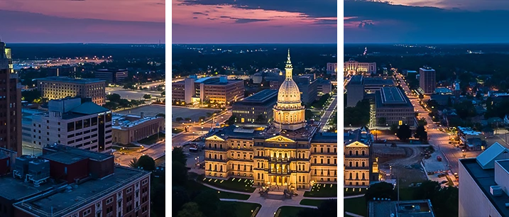 a city with a body of water in the background