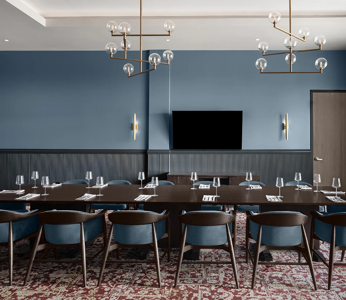 a room with tables and chairs
