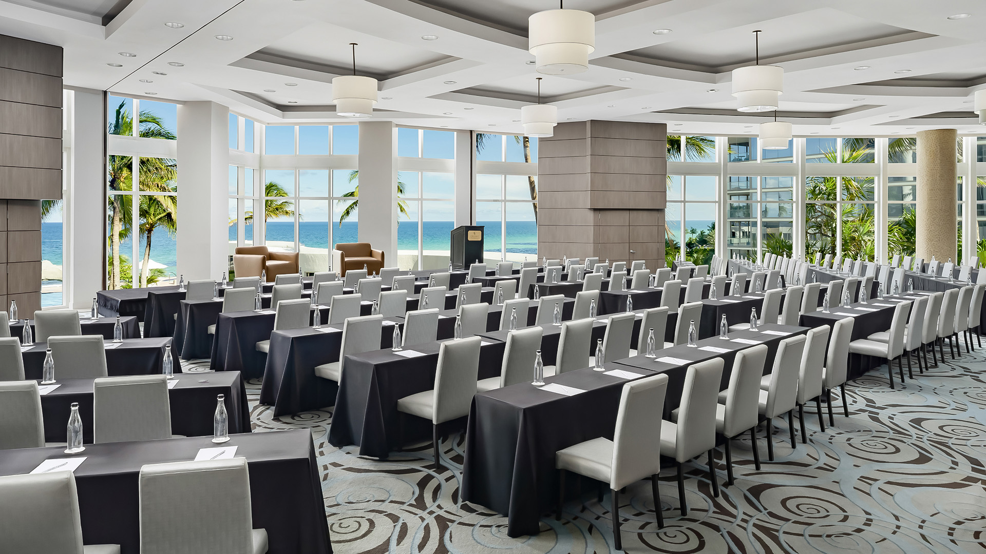 a room with tables and chairs