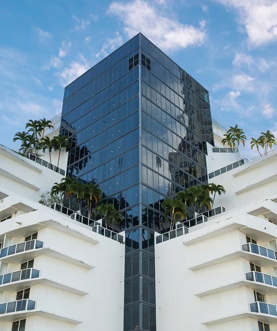 a building with trees on the top