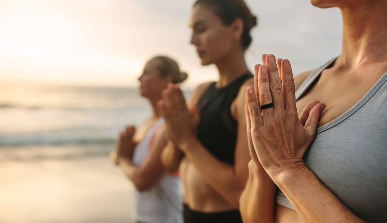 a group of people doing yoga