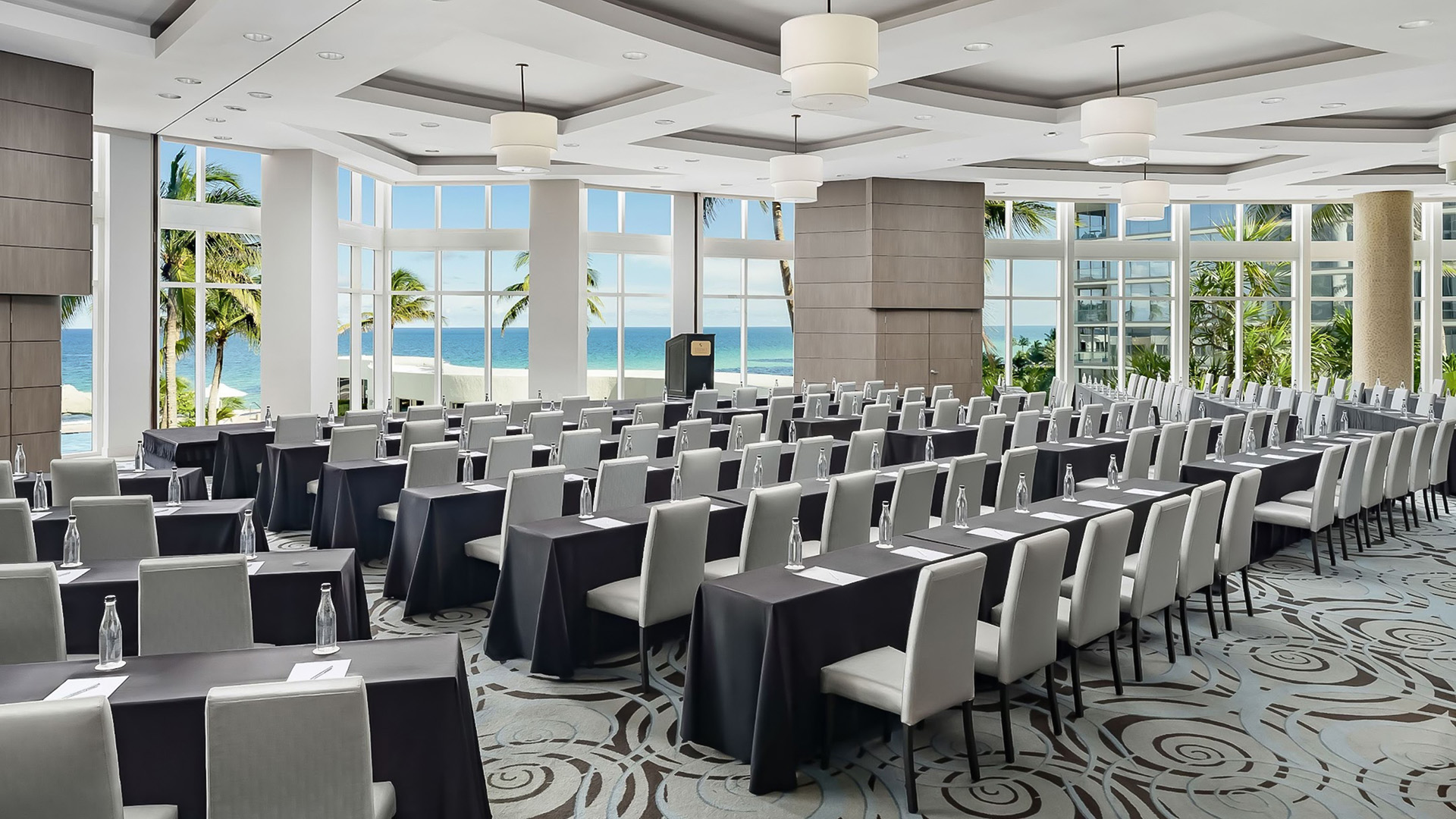 a room with tables and chairs