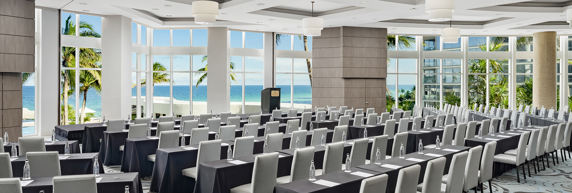 a room with tables and chairs