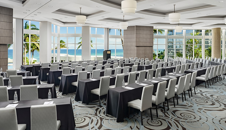 a room with tables and chairs