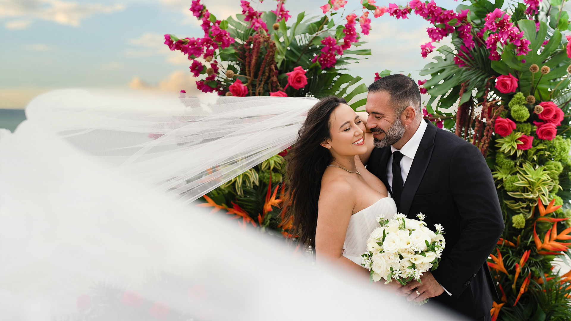 a man and woman in wedding attire