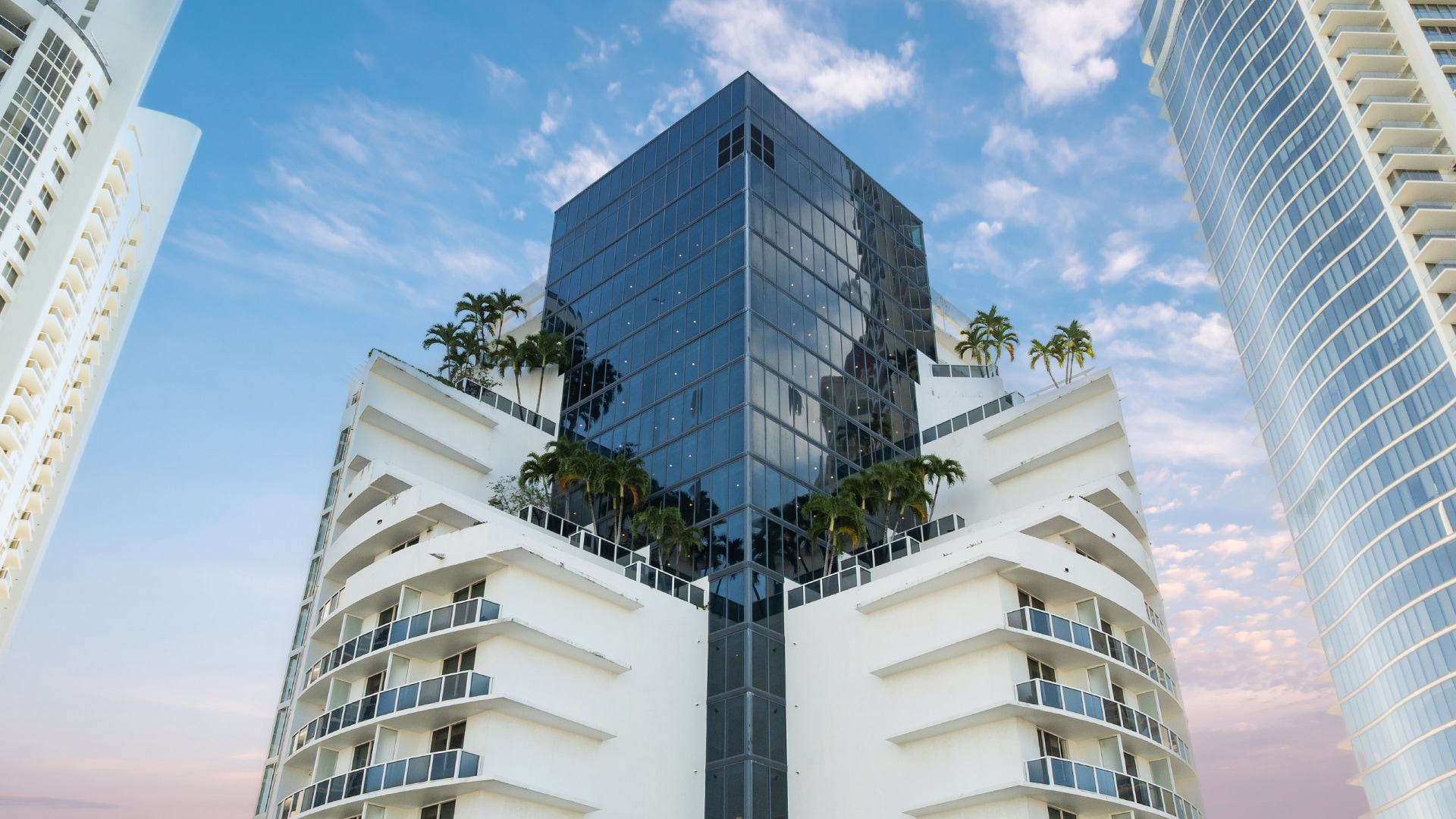 a building with trees on the side