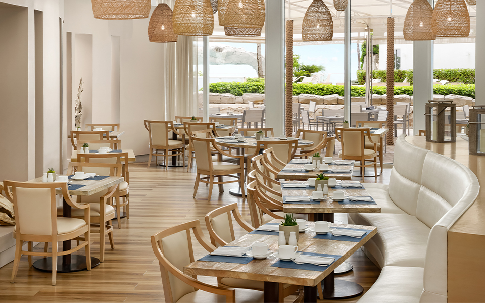 a restaurant with tables and chairs