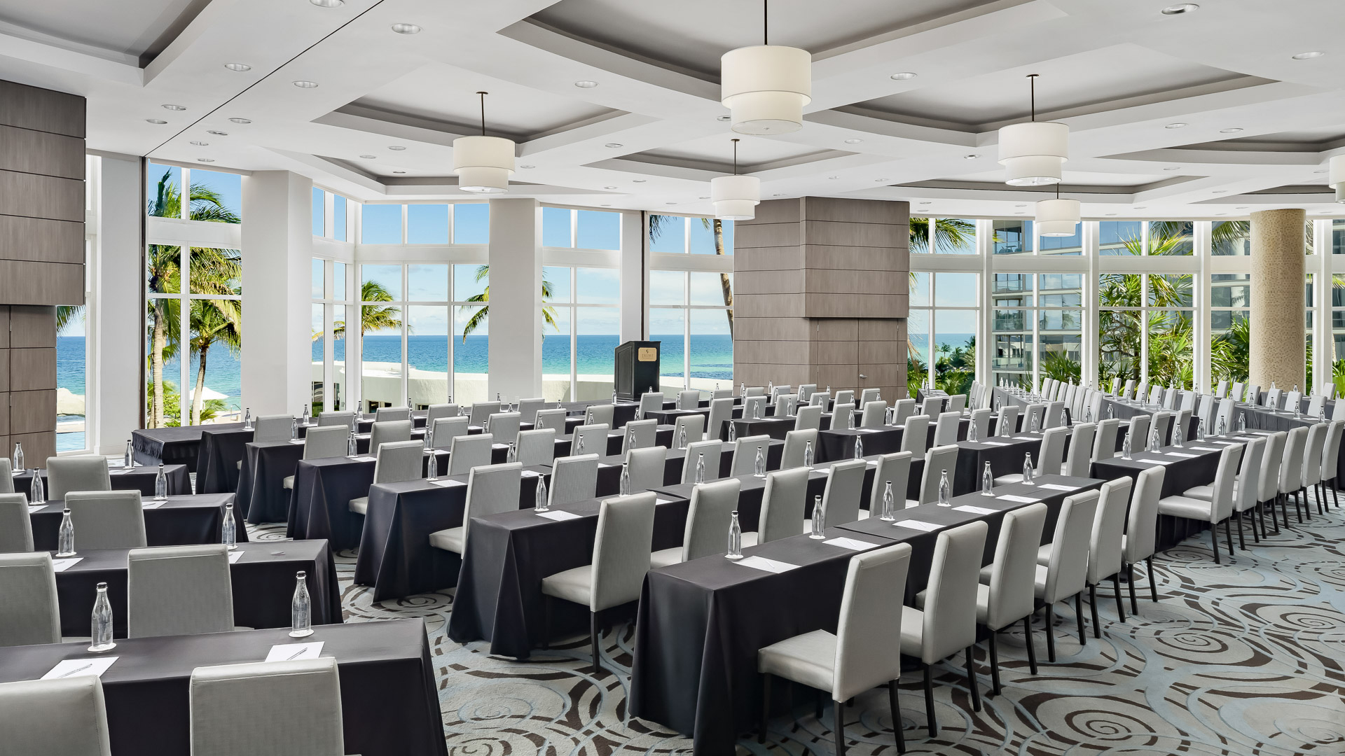 a room with tables and chairs