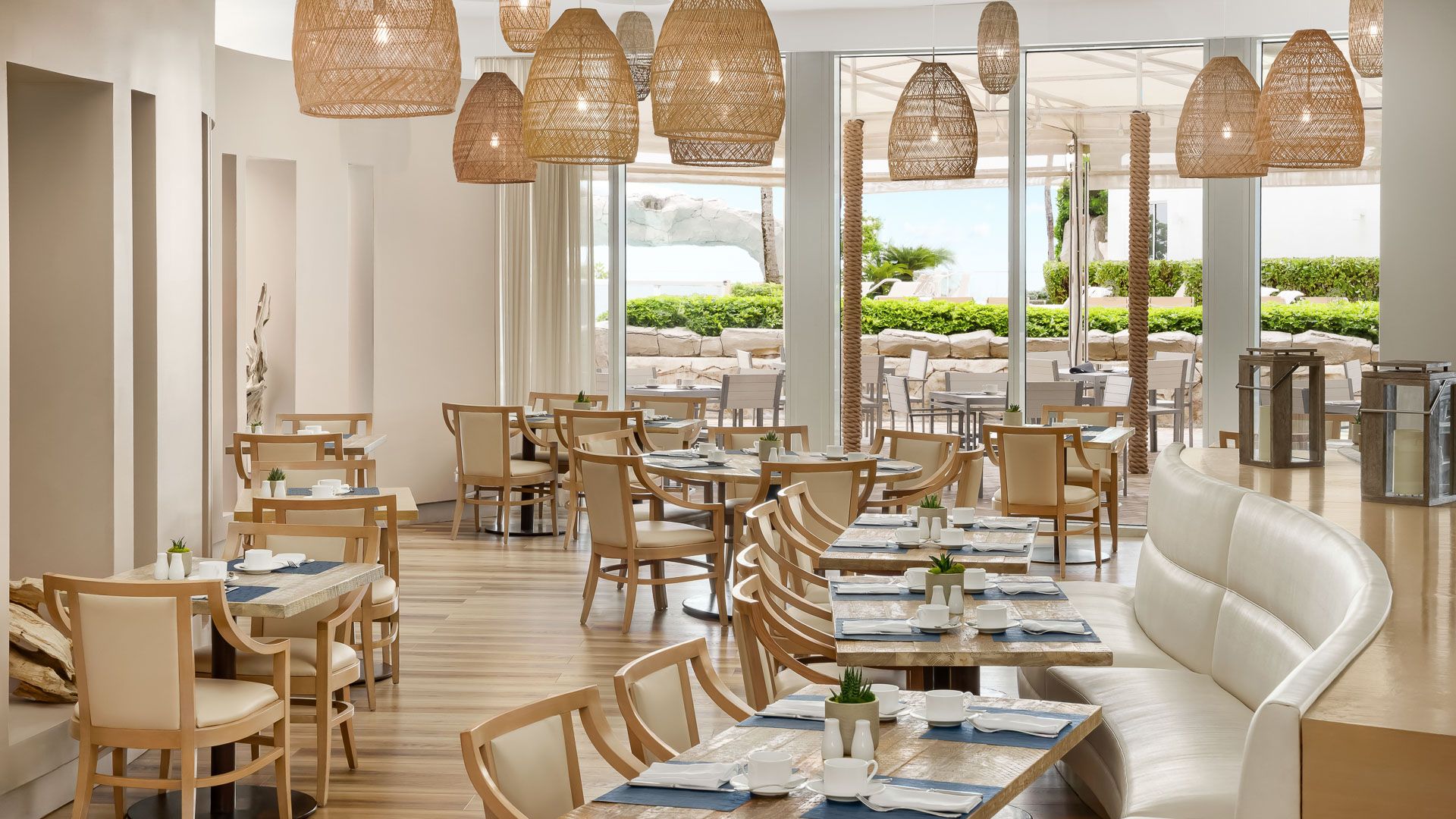 a restaurant with tables and chairs