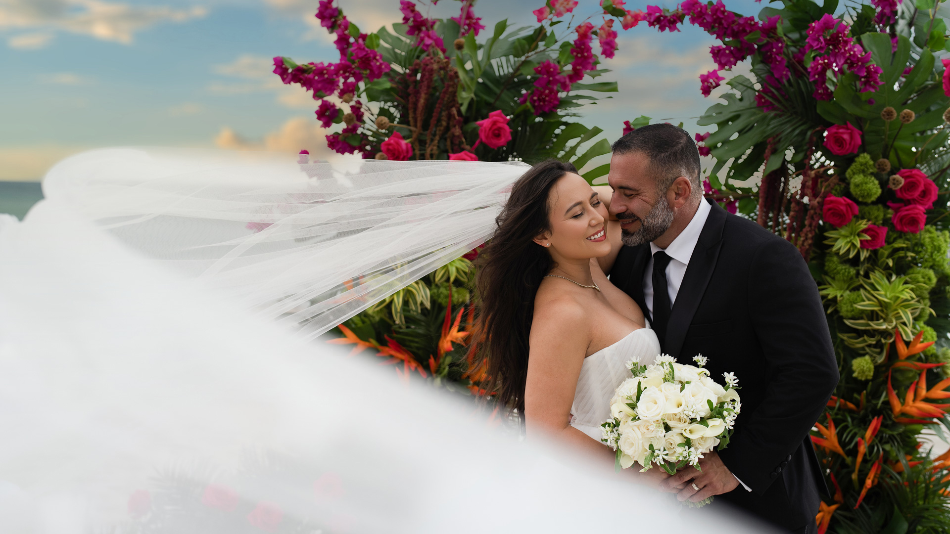 a man and woman in wedding attire