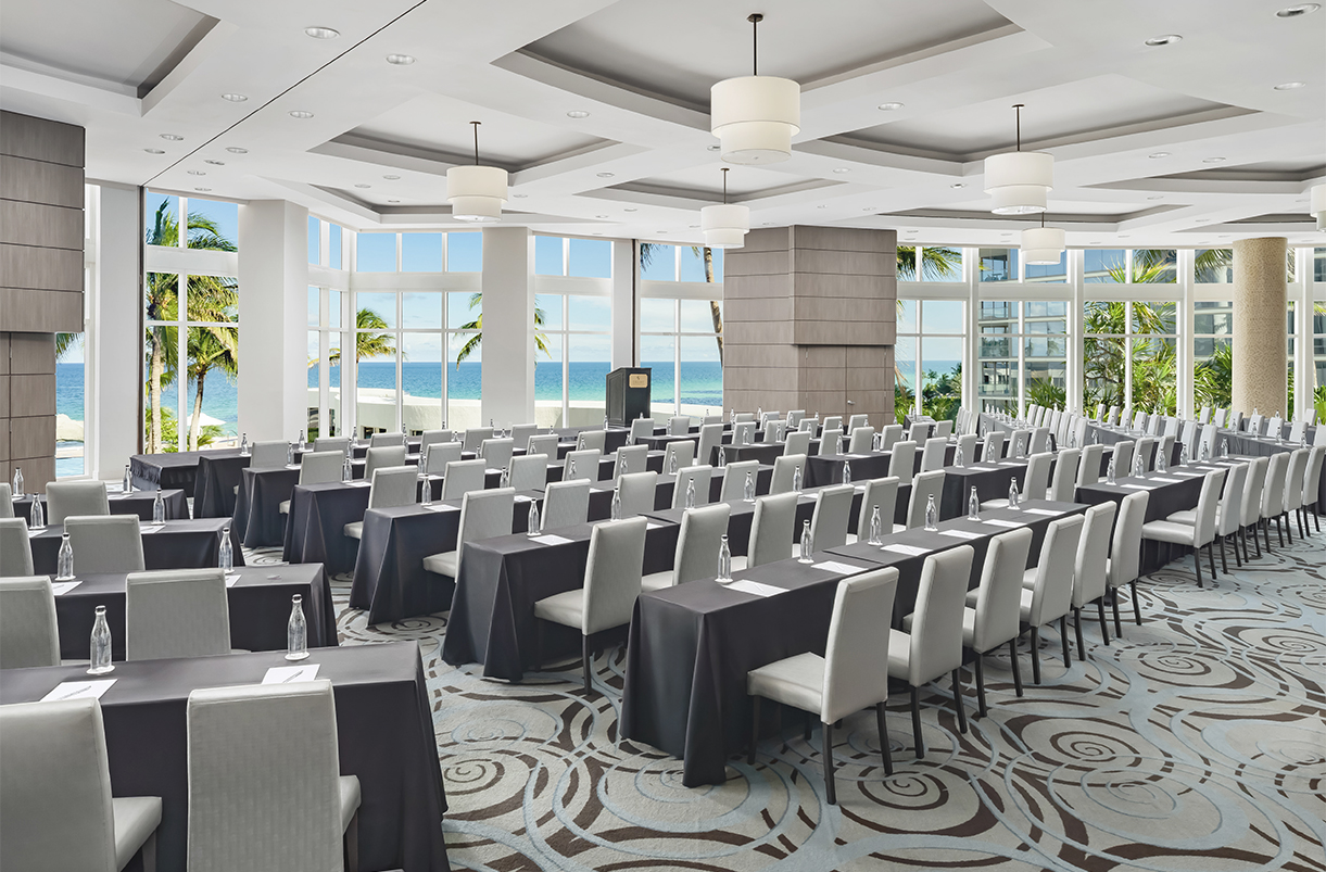 a room with tables and chairs