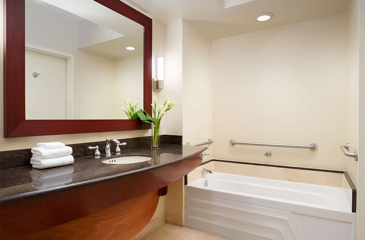 a bathroom with a sink and bathtub