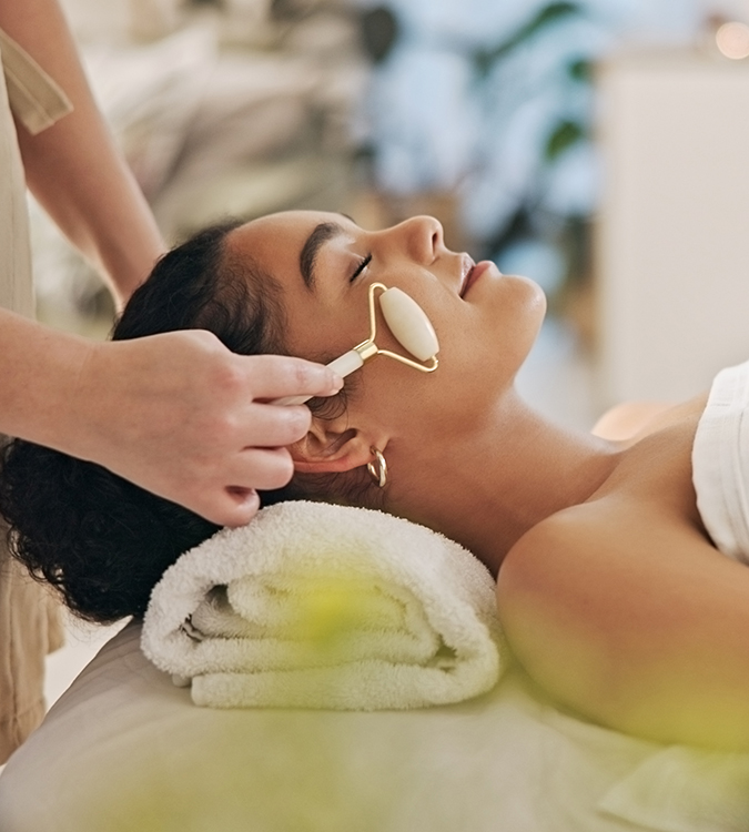 a woman getting a facial massage