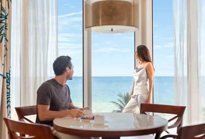 a man and woman looking at each other
