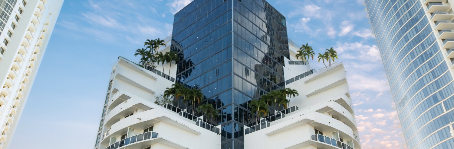 a building with trees on the side
