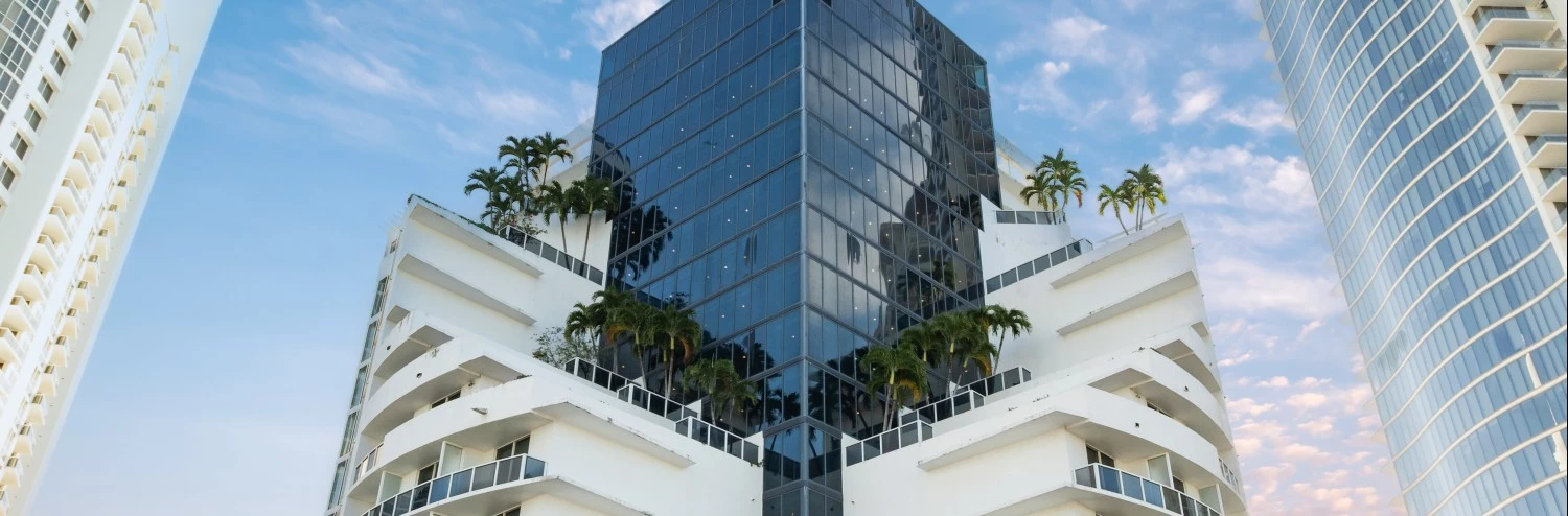 a building with trees on the side