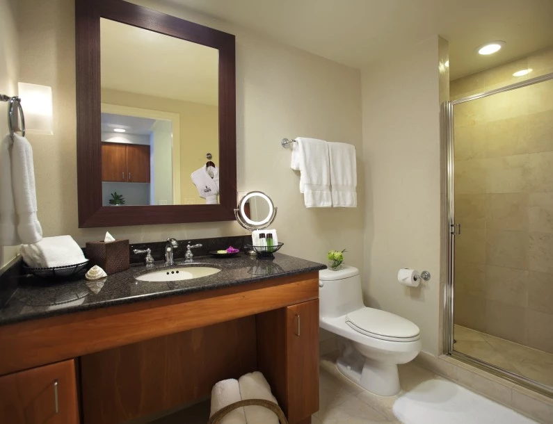 a bathroom with a mirror and sink