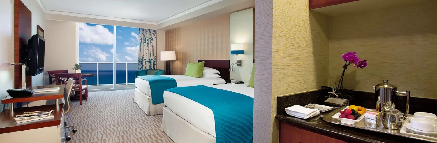 a hotel room with two beds