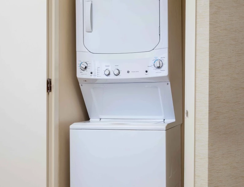 a washing machine in a closet