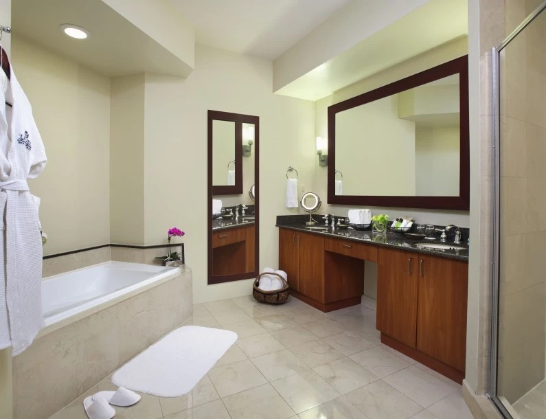 a bathroom with a tub and sink
