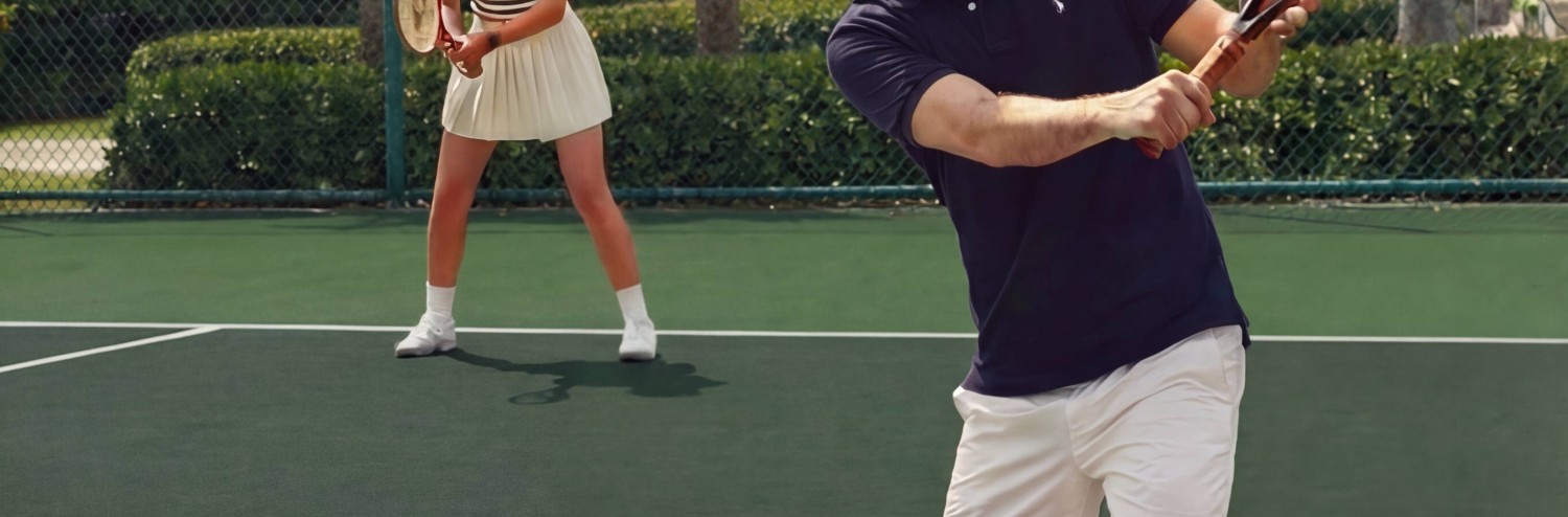 a man and woman playing tennis