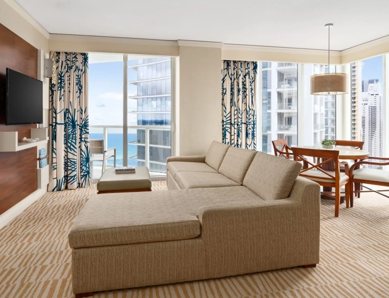 a living room with a couch and a table