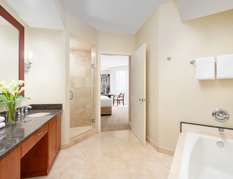 a bathroom with a bathtub and a sink