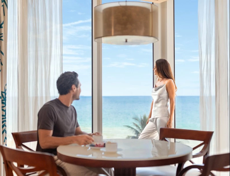 a man and woman looking at each other