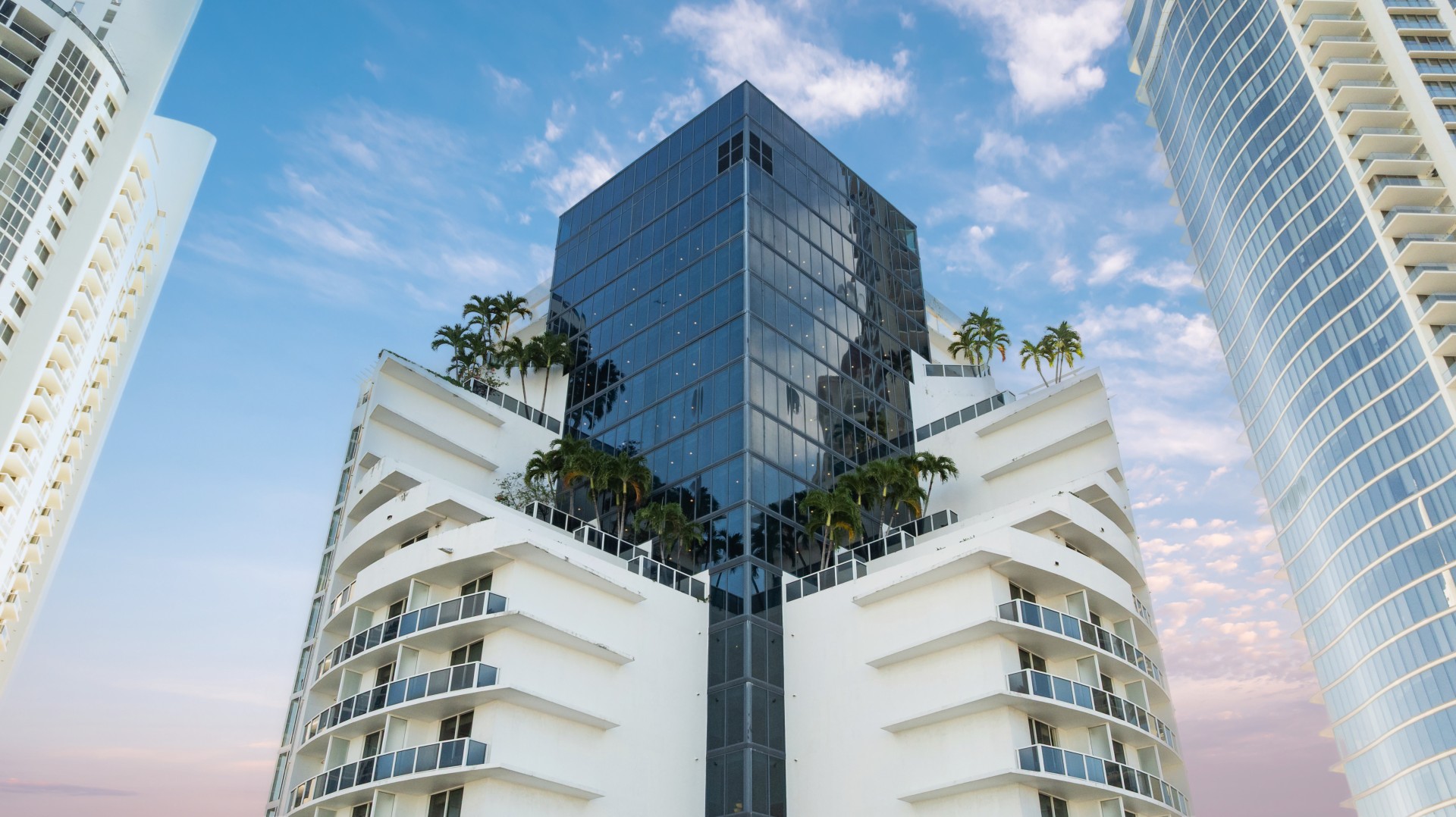 a building with trees on the side