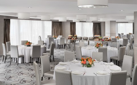 a room with tables and chairs