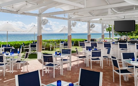 a restaurant with tables and chairs
