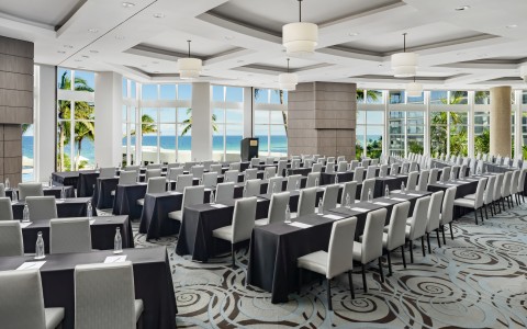 a room with tables and chairs