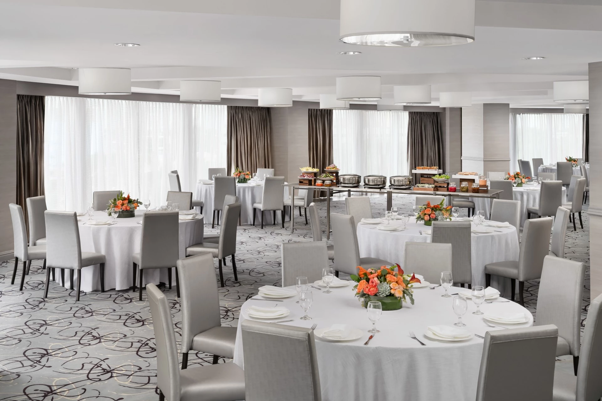 a room with tables and chairs