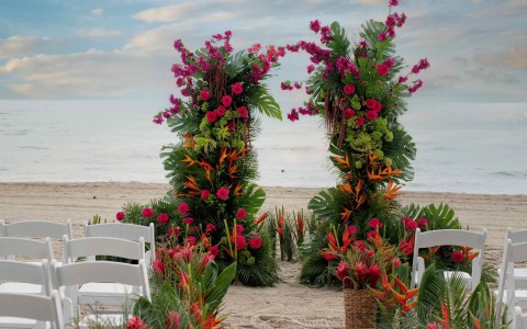 a wedding ceremony set up on a beach
