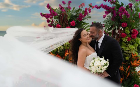 a man and woman in wedding attire
