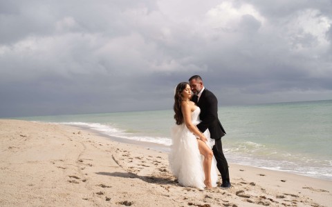 a man and woman on a beach