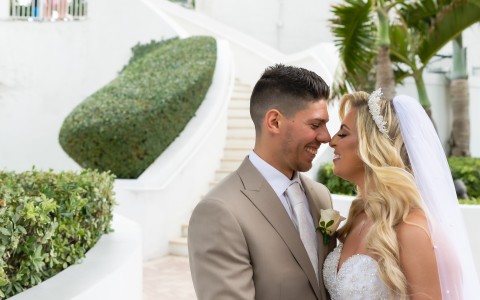 a man and woman in wedding attire