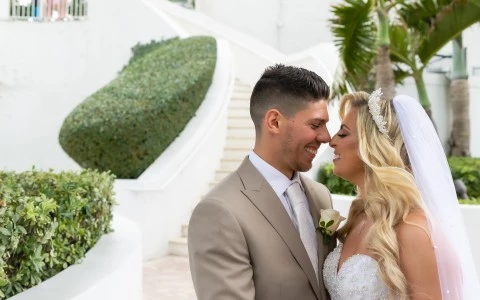 a man and woman in wedding attire