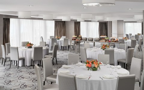 a room with tables and chairs