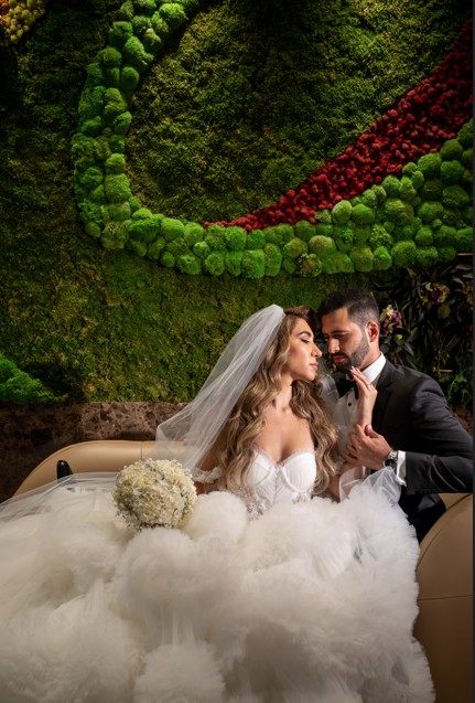a man and woman in wedding attire